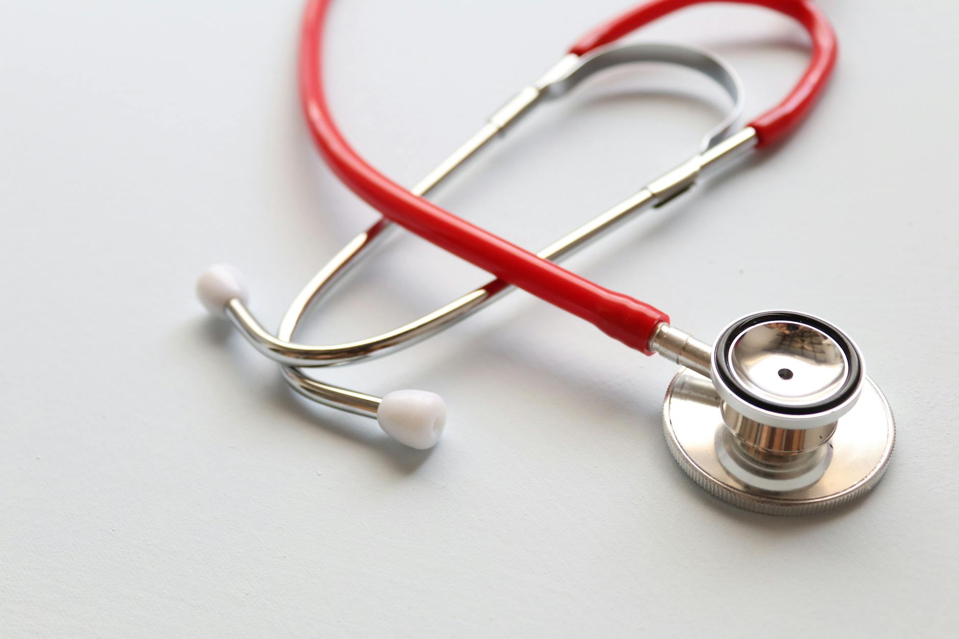 stethoscope on white surface